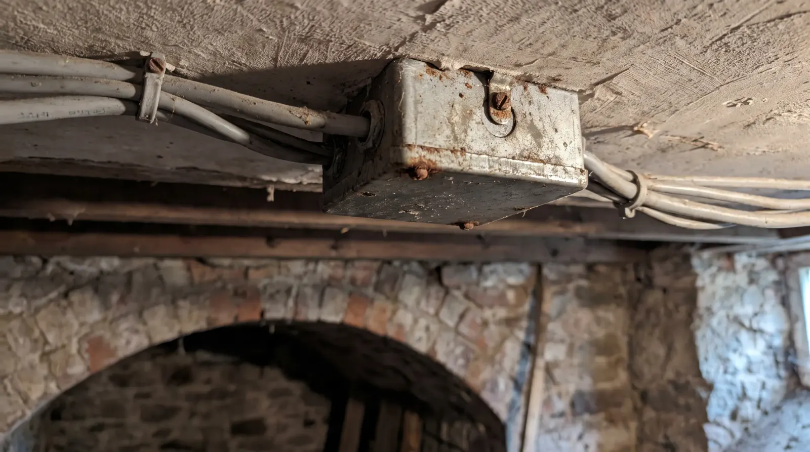 A junction box in the cellar ceiling of a terraced house — fault finding in Newham