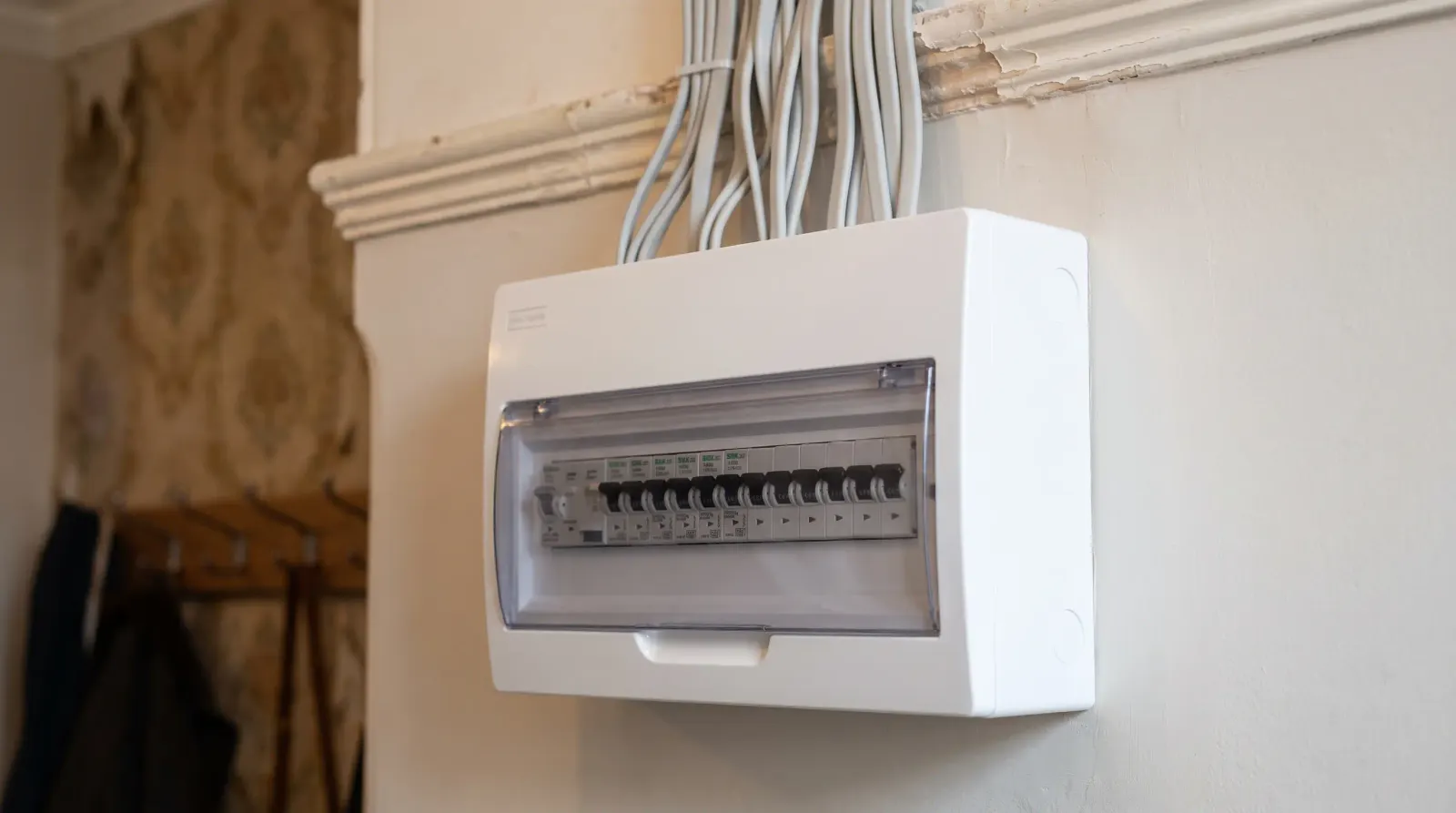 A modern consumer unit fitted in a Victorian hallway — the kind of fuse board upgrade an electrician in Plaistow is called out for